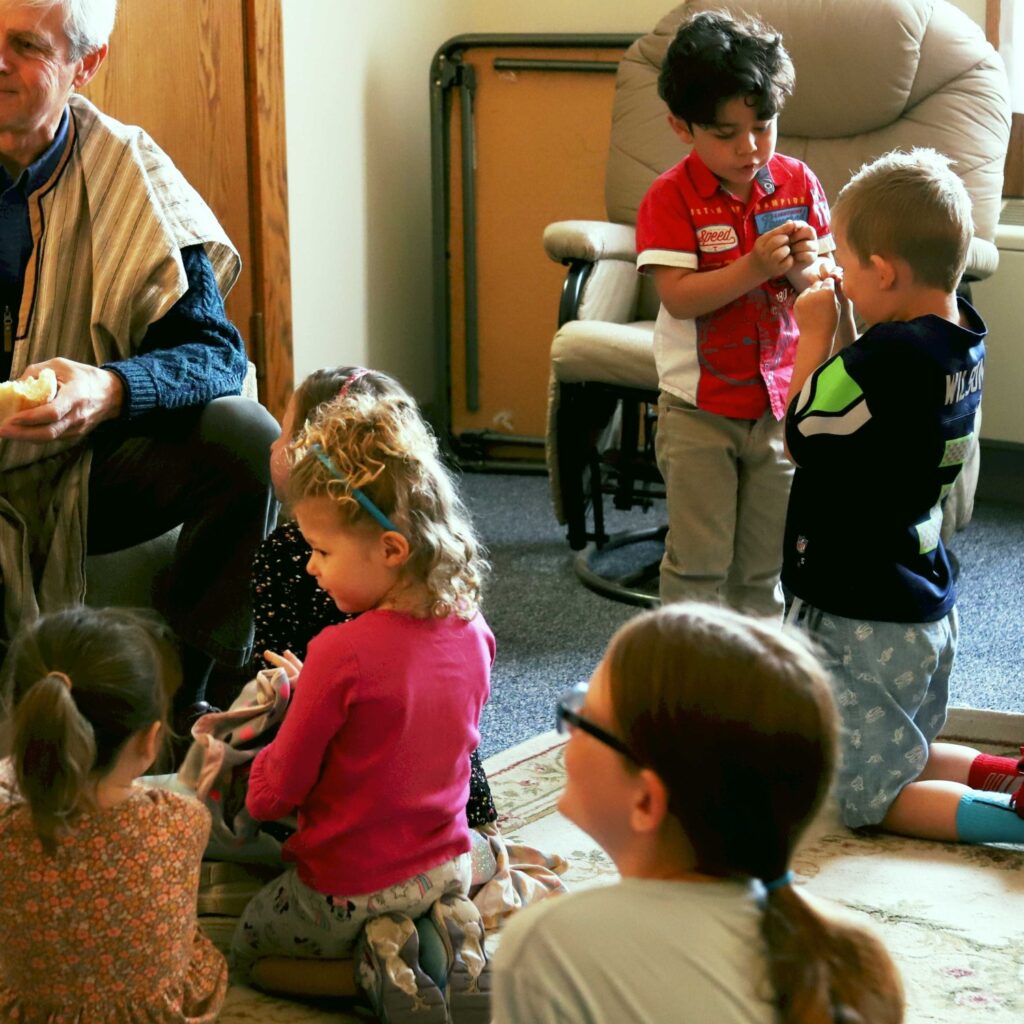 A group of children participate in Vacation Bible School.